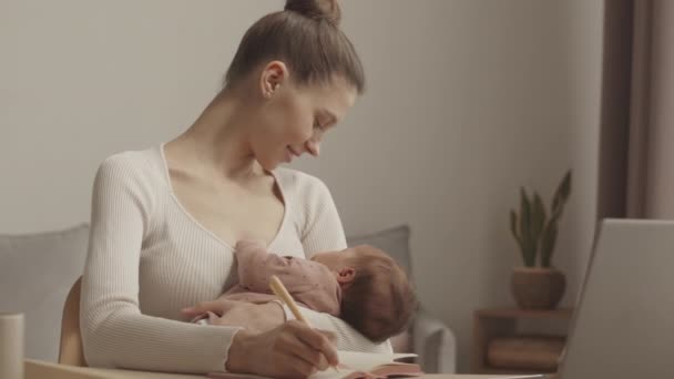 Waist Slowmo Young Mother Working Studying Laptop Home Holding Infant — Vídeos de Stock