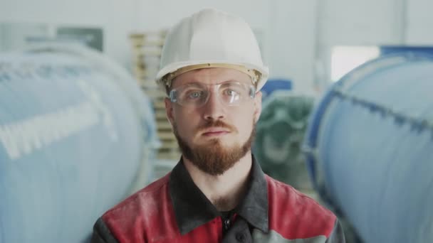 Medium Closeup Portrait Serious Young Caucasian Man Safety Glasses Hard — Vídeo de stock