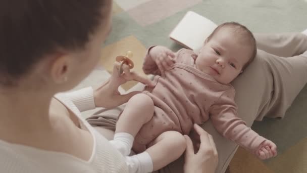 Slowmo Young Mother Taking Care Sleepy Infant Baby Daughter Lying — Stockvideo