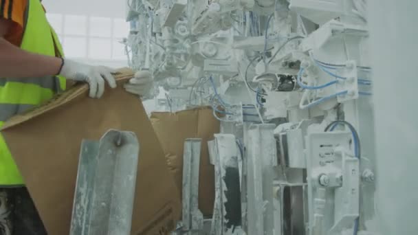 Cropped Shot Male Factory Worker Filling Processed Marble Aggregate Bags — Video