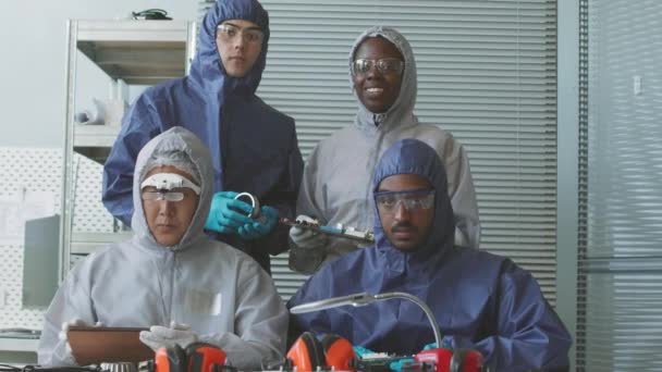 Portrait Young Diverse Team Scientist Engineers Protective Coveralls Safety Glasses — Stock Video