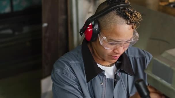 Waist Shot Professional Female Mechanic Safety Headphones Glasses Operating Machine — Vídeos de Stock