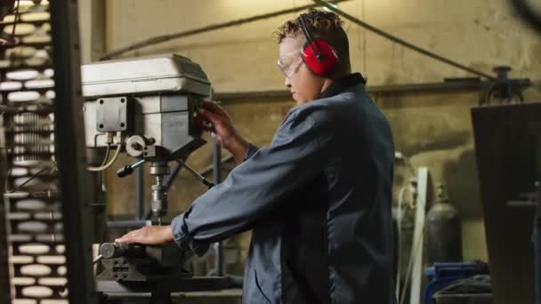 Medium Shot Female Plant Worker Safety Headphones Glasses Operating Drilling — Stock video