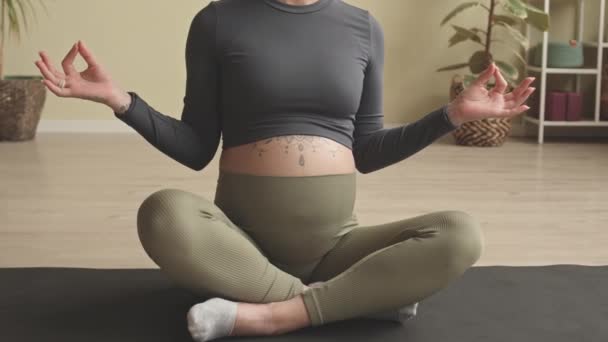 Cropped Slowmo Unrecognizable Pregnant Woman Sitting Yoga Pose Mat Her — Stock video