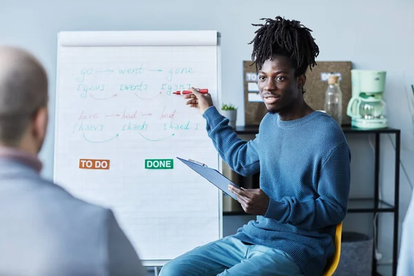 Portrait Black Young Man Writing Whiteboard English Lesson Group People — Stock Photo, Image