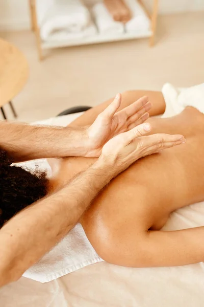 Warm Toned Closeup Man Massaging Back Shoulders Young Woman Spa — Stock Photo, Image