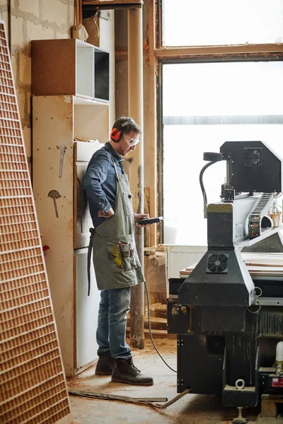 Full Length Portrait Male Carpenter Operating Wood Cutting Machine Automated — Stock Photo, Image