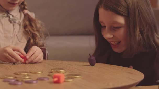 Two Cheerful Little Girls Playing Dreidels Chocolate Coins Hanukkah — Stock Video