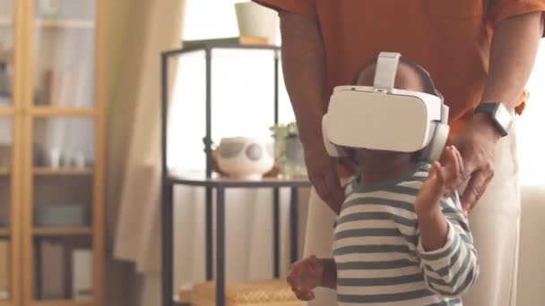 Little African American Girl Walking Living Room Father Wearing Headset — Stock Video