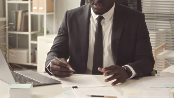 Cropped Pov Serious Black Male Employer Modern Black Suit Talking — стоковое видео