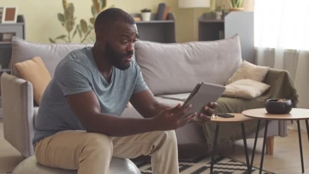 Black Man Talking Friend Video Chat Digital Tablet While Staying — Stock Video