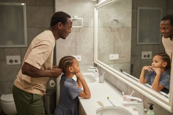 Side View Portrait Caring Black Father Braiding Daughters Hair Mirror — Stock Photo, Image