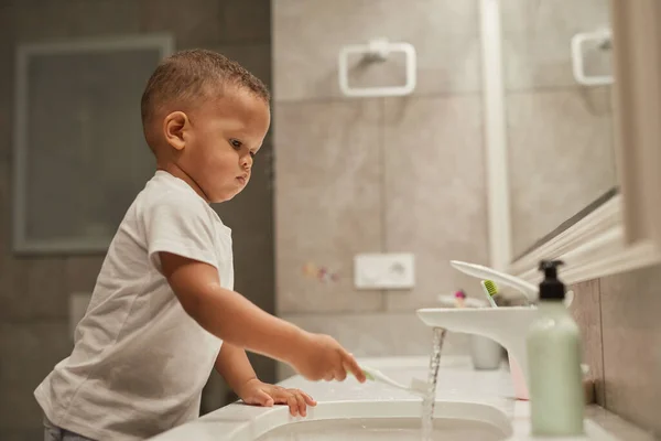 Side View Portrait African American Toddler Boy Brushing Teeth Bathroom — Stock Photo, Image