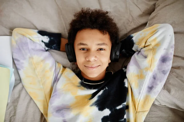 Top View Portrait Black Teenage Boy Wearing Headphones Lying Bed — Stock Photo, Image