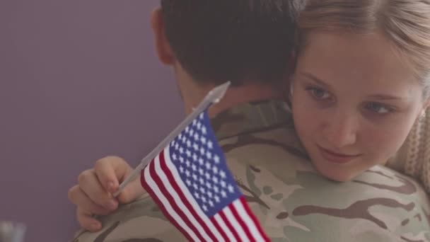 Medium Closeup Pretty Caucasian Girl Flag Hand Embracing Her Father — Stock Video