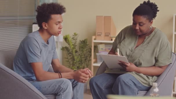 Medium Slowmo Upset Biracial Teen Boy Having Conversation Black Female — Stock video