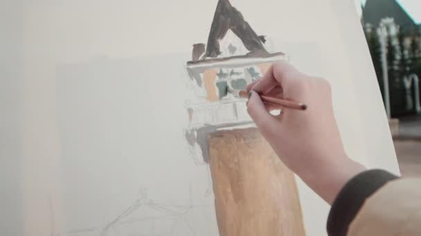 Pov Unrecognizable Female Artist Painting Tower Canvas Outdoors — стоковое видео