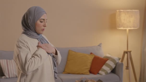 Young Muslim Woman Casualwear Headscarf Praying Rug Home — Stock Video