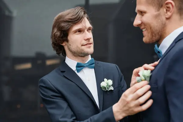Portrait Smiling Young Man Fixing Grooms Boutonniere Wedding Ceremony Same — Stock Photo, Image