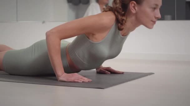 Young Caucasian Woman Doing Upward Facing Dog Pose Group Yoga — Stock Video
