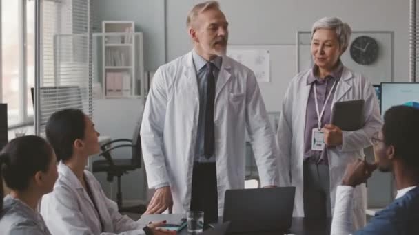 Medium Shot Diverse Medical Team Wearing Scrubs Lab Coats Applauding — Stock Video