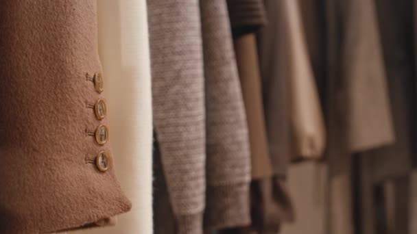 People Closeup Elegant Wrist Buttons Expensive Camel Wool Coat Hanging — Stock video