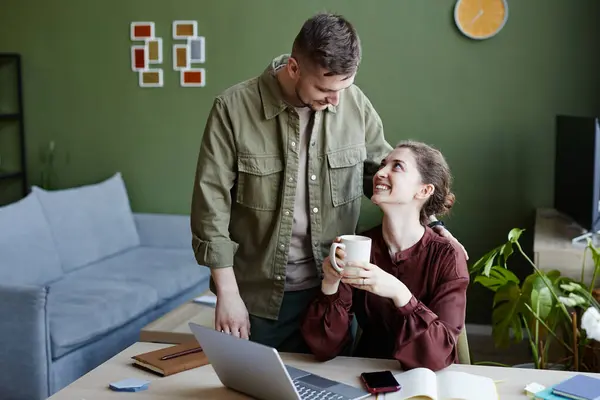 Young Man Bringing Coffee His Girlfriend While She Working Online — Stock Photo, Image