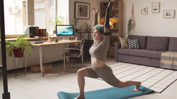 Full Length Shot Flexible Caucasian Girl Artificial Arm Practicing Yoga — Stock Video