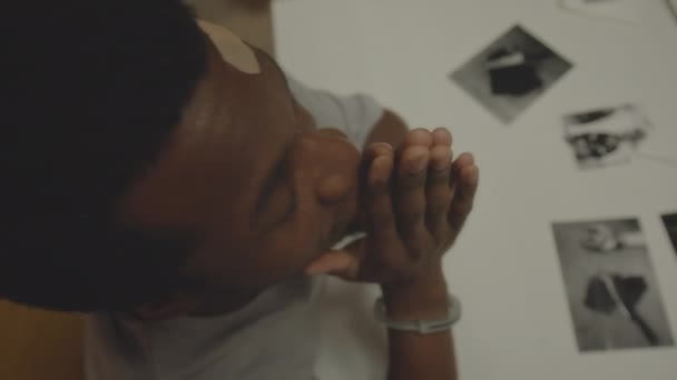 Closeup Suspect Black Man Handcuffs Making Praying Hands Looking Ceiling — Stock Video