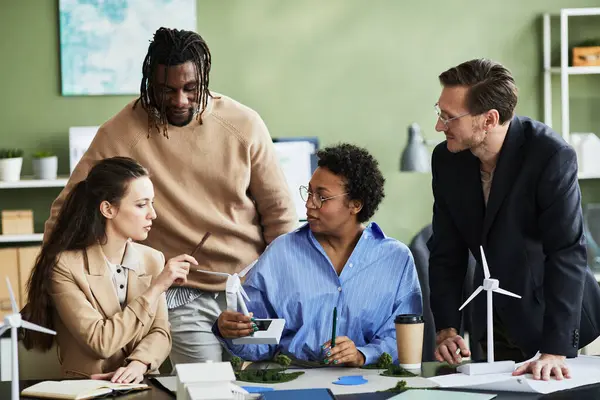 Business People Working Team Table Meeting Discussing Work Windmill Planning — Stock Photo, Image