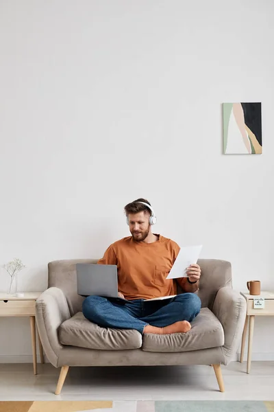 Young Male Student Casualwear Sitting Couch Looking Laptop Screen While — Stock Photo, Image