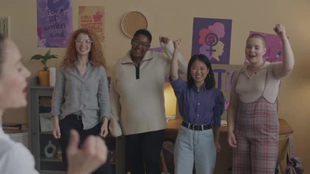 Medium Shot Diverse Group Feminist Activists Female Leader Head Raising — Stock Video