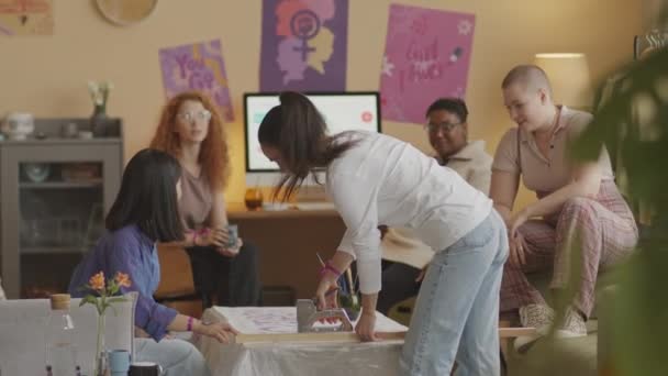 Medium Shot Diverse Team Young Enthusiastic Feminists Chatting While Creating — Stock Video