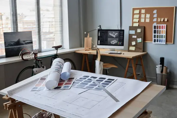 Background image of architects office with focus on floor plans, copy space