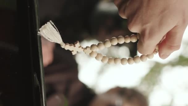 Vertical Closeup Priest Holding Rosary Beads Hands While Saying Prayer — Stock Video