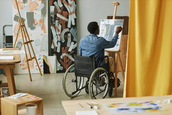 Back View Young Black Man Sitting Wheelchair Front Easel Painting — Stock Photo, Image
