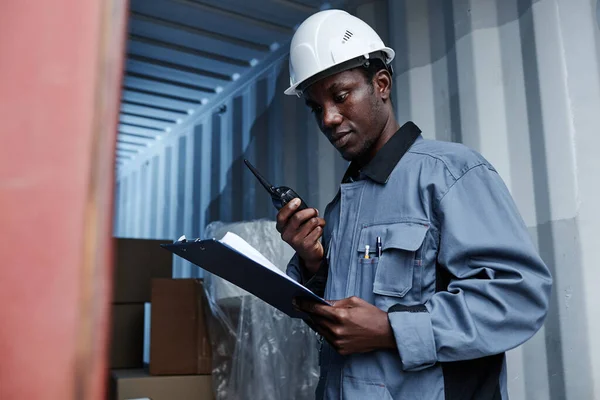 Waist Portrait Young Male Worker Wearing Hardhat While Checking Containers — Stock Photo, Image