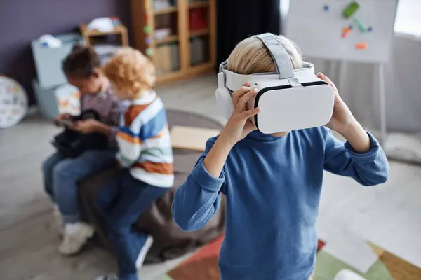 Blond Little Boy Headset Standing Front Camera Enjoying Virtual Game — Stock Photo, Image