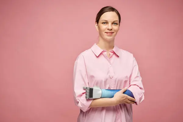 Portrait Smiling Young Woman Bionic Arm Standing Pink Background — Stock Photo, Image