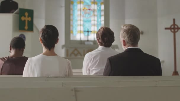 Back View Slowmo Group Diverse Parishioners Sitting Benches Front Black — Stock Video