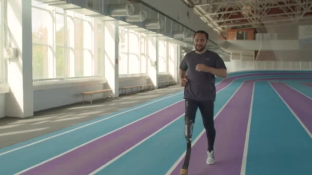 Full Length Slow Motion Shot Caucasian Male Runner Prothetic Running — Stock video