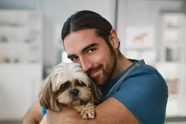 Young Smiling Vet Clinician Holding Cute Fluffy Yorkshire Terrier Looking — Stock Photo, Image