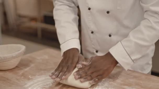Tilt Shot Concentrated African American Baker White Uniform Kneading Dough — Stock Video