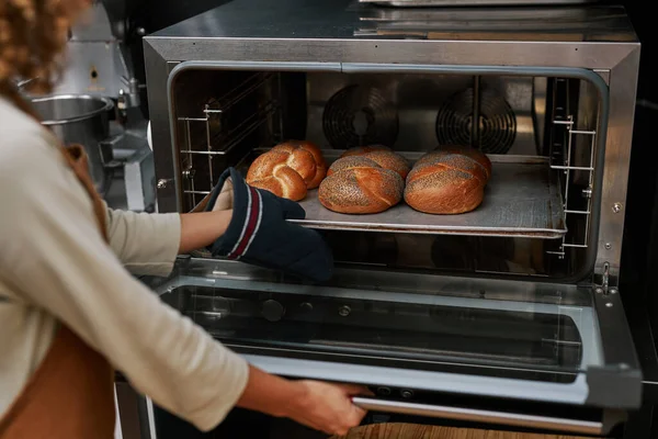 Baker Wearing Mittens Taking Tray Bread Out Oven — Stock Photo, Image