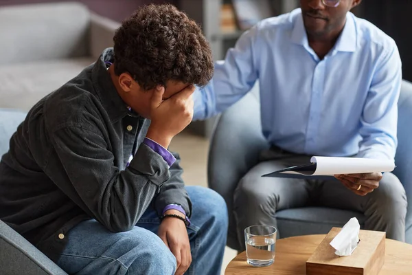 Adolescent Psychologist Reassuring Crying Teenage Boy — Stock Photo, Image