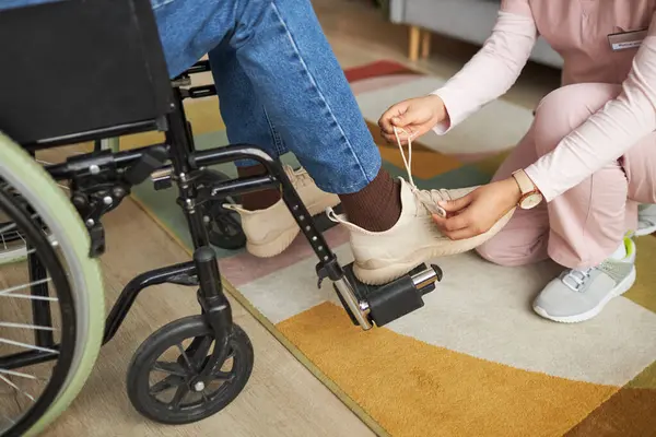 Close Caregiver Helping Tie Shoelace Senior Man Disability She Caring — Stock Photo, Image