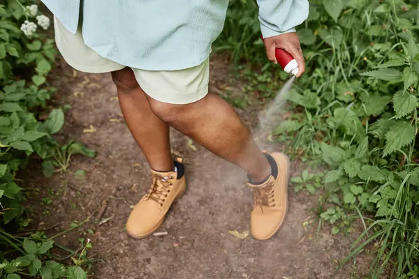 High Angle Closeup Black Woman Spaying Legs Bug Repellent While — Stock Photo, Image