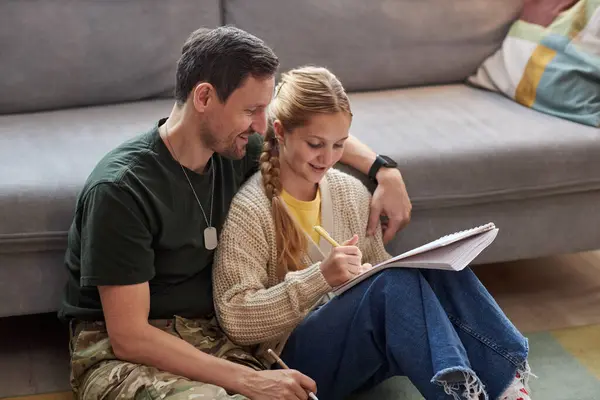 Portrait Caring Military Father Helping Daughter Doing Homework While Sitting — Stock Photo, Image