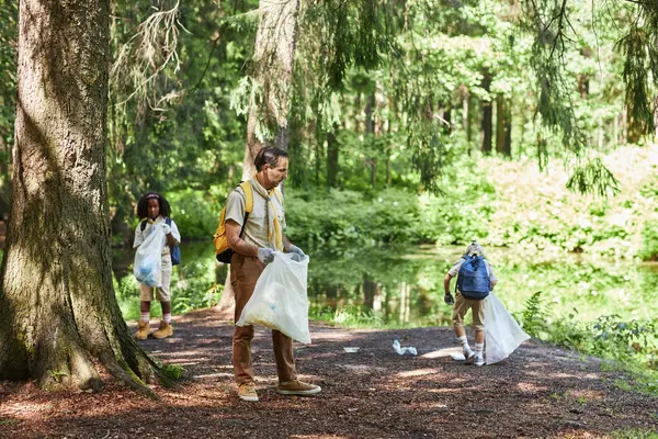 Group Scouts Cleaning Forest Focus Leader Foreground Copy Space — Stock Photo, Image