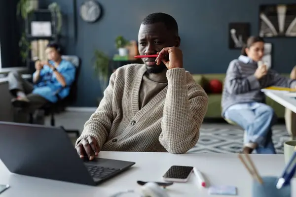 Portrait Bored African American Man Playing Pencil While Working Desk — Stock Photo, Image